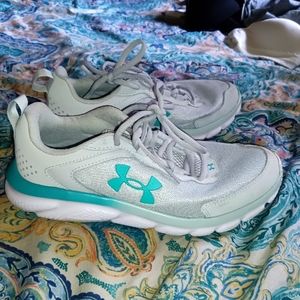 Grey and teal under armor shoes